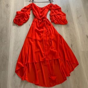 Orange/red off shoulder hi- low dress. Ruffled sleeves. Size M